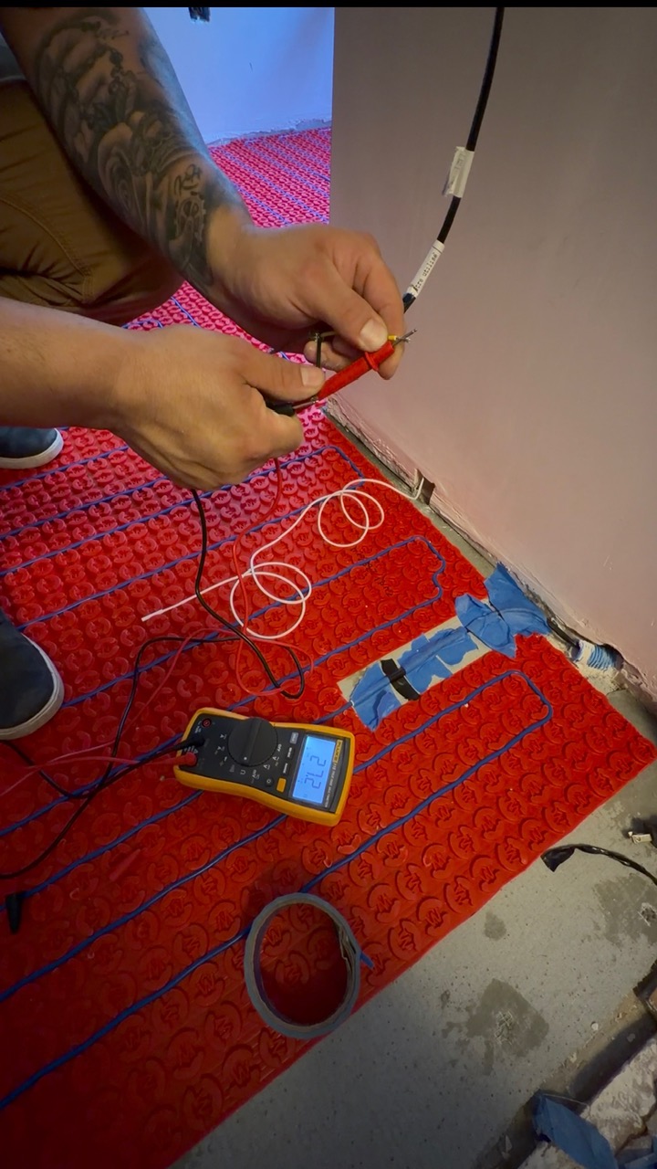 Electrical floor heating installation and testing with multimeter